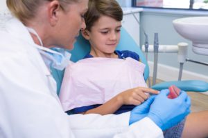 Young boy meeting with his knoxville dentist for the first time