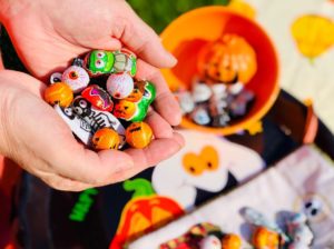 hands holding halloween candy