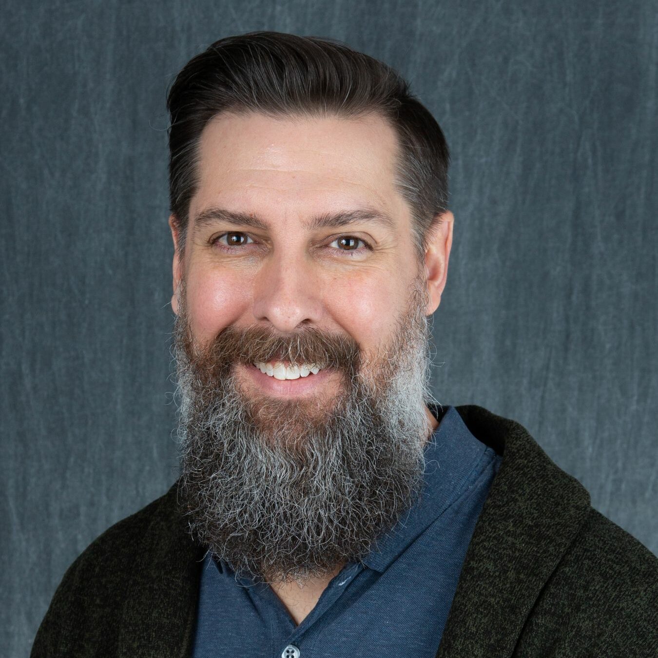 University General Dentists, a Knoxville dentist, logo on a white background