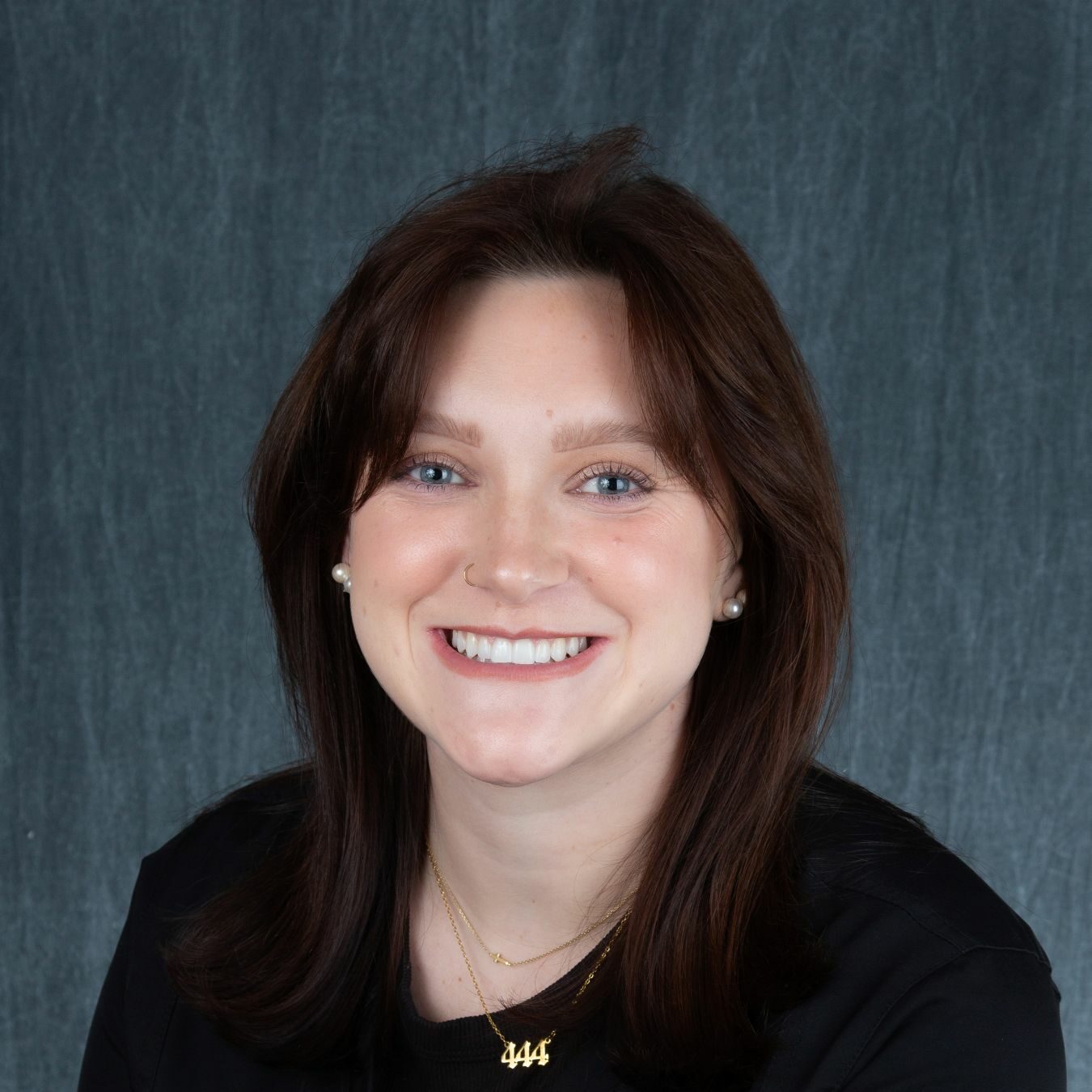 University General Dentists, a Knoxville dentist, logo on a white background